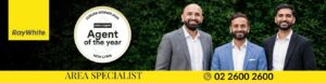Area Specialist team of Ray White Austar Realty, New Lynn real estate agents Robbie Bhullar, Vish Bhati and Piyush Singh, with the RateMyAgent Agent of the Year Suburb Winner New Lynn 2026 badge